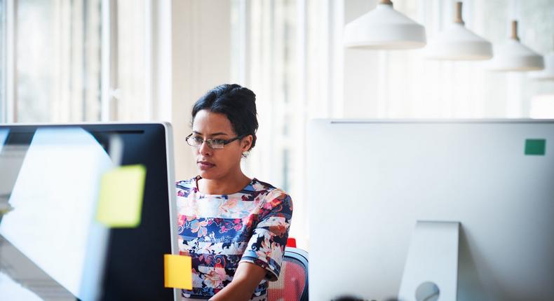 woman typing on computer