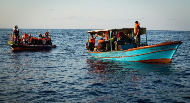 A handout photo released on September 24, 2018 by SOS Mediterranee shows migrants being rescued the day before off the coast of Libya