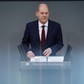 Kanclerz Niemiec Olaf Scholz przemawia w Bundestagu