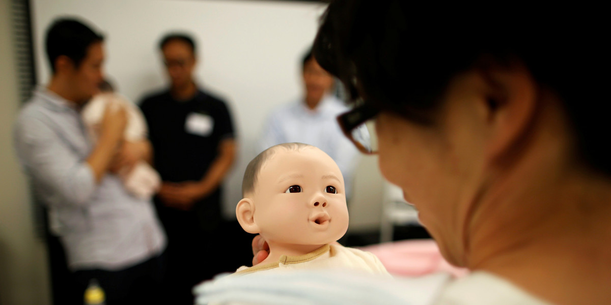 Japanese bachelors are playing with dolls to help them find wives