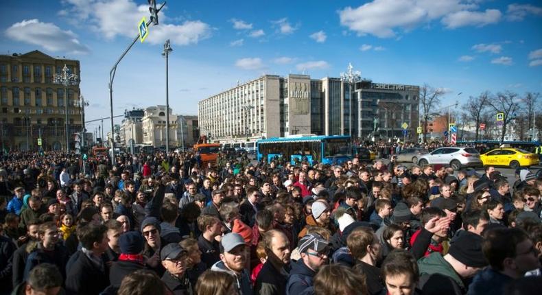 This photo taken on March 26, 2017 shows opposition supporters taking part in an unauthorised anti-corruption rally in central Moscow