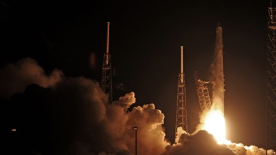 SpaceX's Falcon 9 lifts off early on September 21, 2014, from launch complex 40 at Cape Canaveral.BRUCE WEAVER/AFP/Getty Images