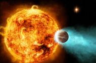 A star with a planet in very close orbit around it, about 880 light years from Earth.
