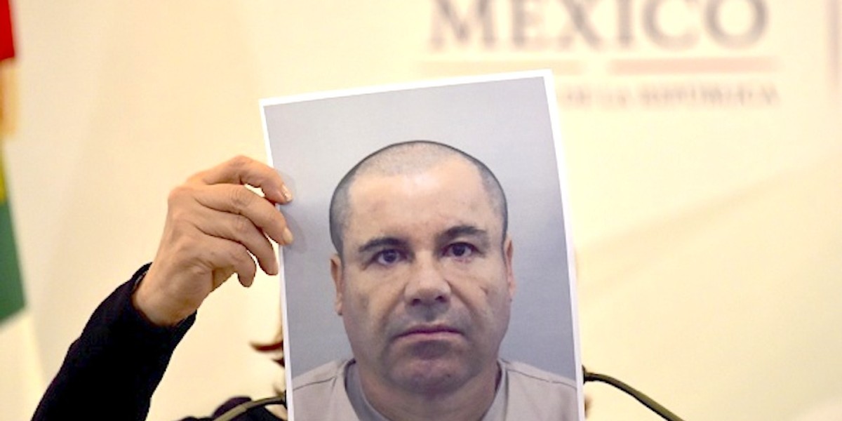 Mexico's attorney general, Arely Gomez, shows a picture of Mexican drug kingpin Joaquín "El Chapo" Guzmán during a press conference in Mexico City, on July 13, 2015.