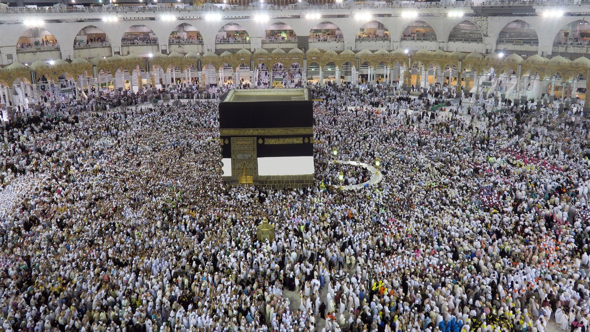 Muslim pilgrims circle the Kaaba at the Grand Mosque in Mecca