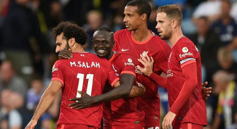 Liverpool's Sadio Mane (C) celebrates with Mohamed Salah (L) Creator: Oli SCARFF