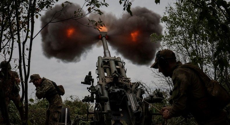 Ukrainian service members fire a shell from a M777 Howitzer at a front line, as Russia's attack on Ukraine continues, in Kharkiv Region, Ukraine July 21, 2022.