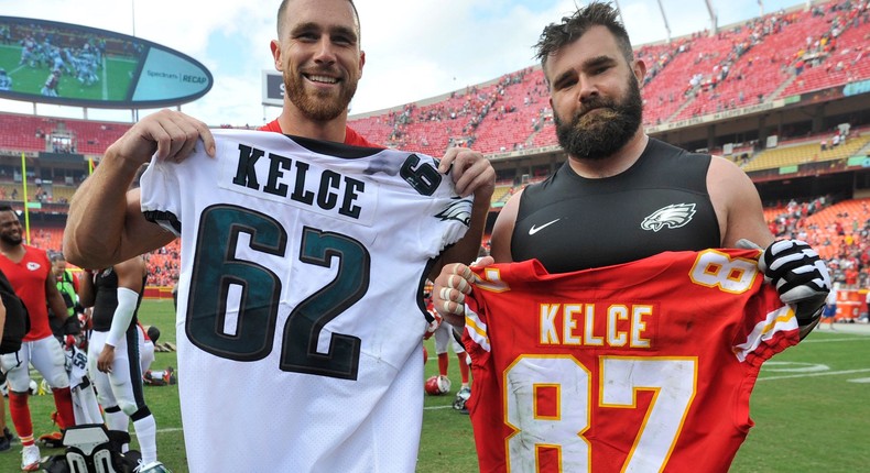 Travis Kelce and Jason Kelce exchange jerseys after playing against each other in 2017.AP Photo/Ed Zurga