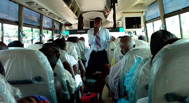 Pastor preaching in trotro