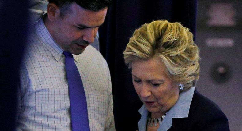 Hillary Clinton with her press secretary, Brian Fallon, in October.