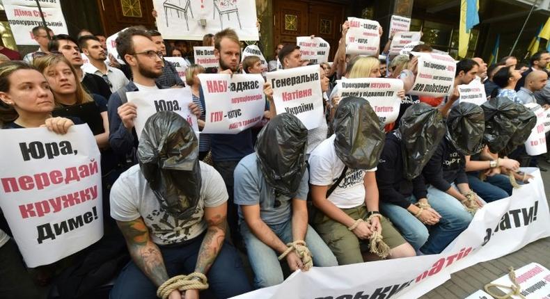 A protest in Kiev against corruption, one of the IMF's key concerns