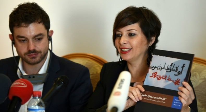 Human Rights Watch's director in Tunisia, Amna Guellali (R), speaks during a press conference on February 2, 2016 in Tunis to present a 33-page document about the country's draconian drug law