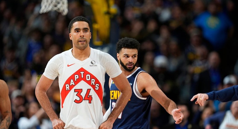 Toronto Raptors center Jontay Porter (left) has been banned for life from the NBA.David Zalubowski