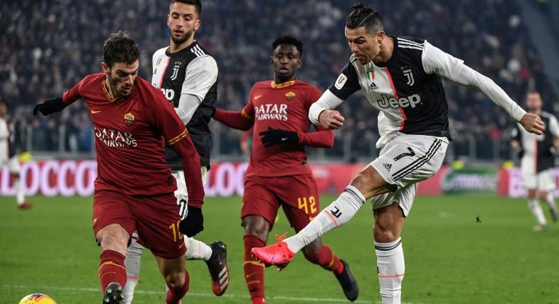 Juventus striker Cristiano Ronaldo (R) got the first goal of the night against Roma.