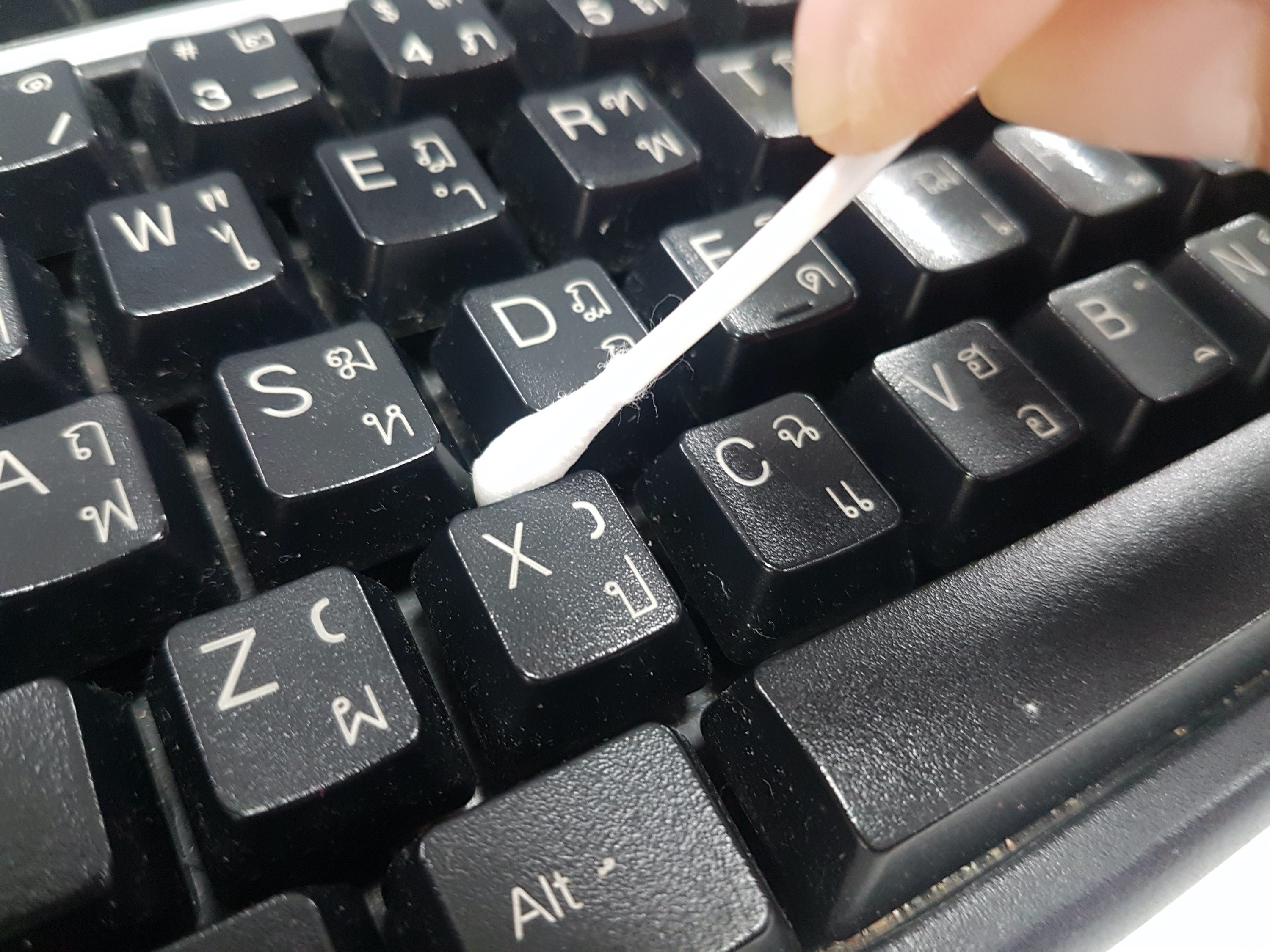 How to properly clean your keyboard without damaging it, whether it's