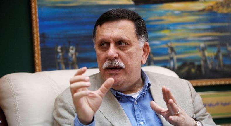 Prime Minister of Libya's unity government Fayez Seraj speaks during an interview with Reuters at his office in the naval base of Tripoli, Libya, June 3, 2016. 