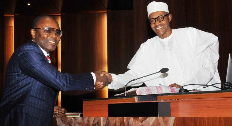 Oil Ministers Dr Kachikwu and President Buhari, pose here for pictures (Presidency)