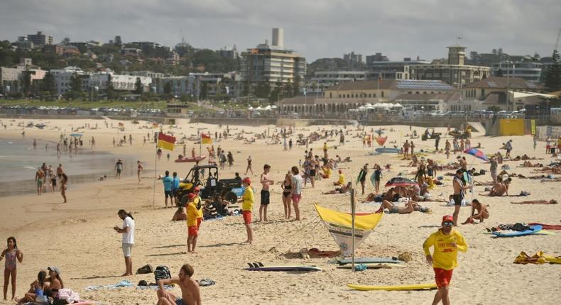 Bondi Beach was closed after sunbathers flouted a ban on non-essential outdoor gatherings of more than 500 people