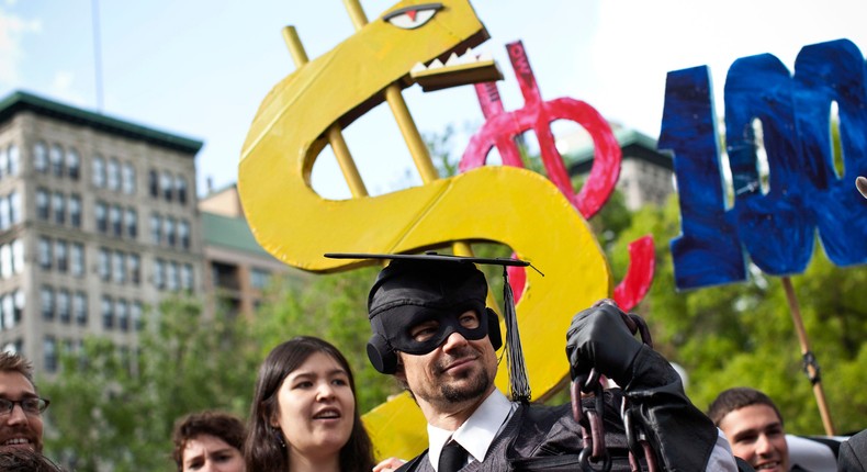 Occupy Wall Street demonstrators protest against the rising national student debt in New York City.