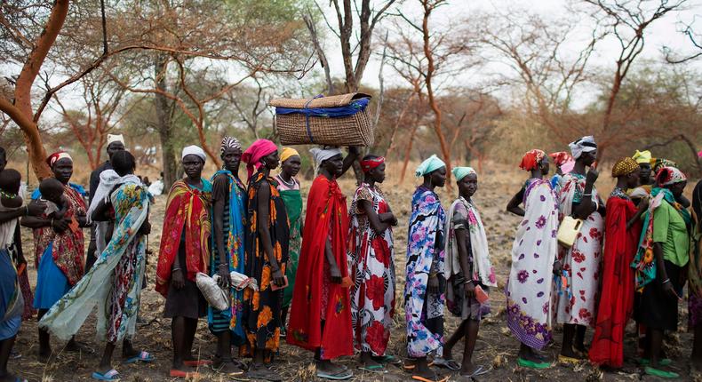 Women are screened for malnutrition at a joint UNICEF-WFP Rapid Response Mission (RRM), which delivers critical supplies and services to those displaced by conflict, in Nyanapol, northern Jonglei, March 3, 2015.