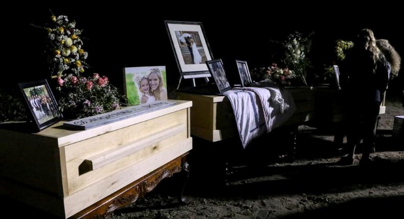 Relatives and friends stand next to coffins holding the remains of Rhonita Miller and four of her children, who were among the nine victims of an attack November 4, 2019, being blamed on a drug cartel in northern Mexico