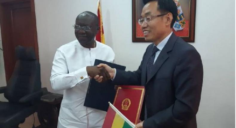 Ken Ofori-Atta and Chinese Ambassador Shi Ting Wang