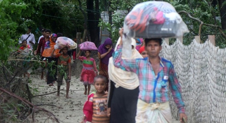 Bangladeshi villagers evacuate to cyclone shelters in Cox's Bazar district on May 30, 2017