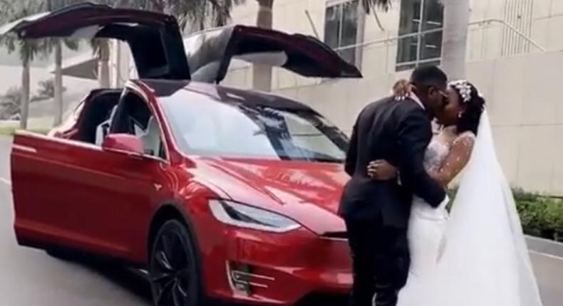 Tesla at Kennedy Osei and Tracy's white wedding