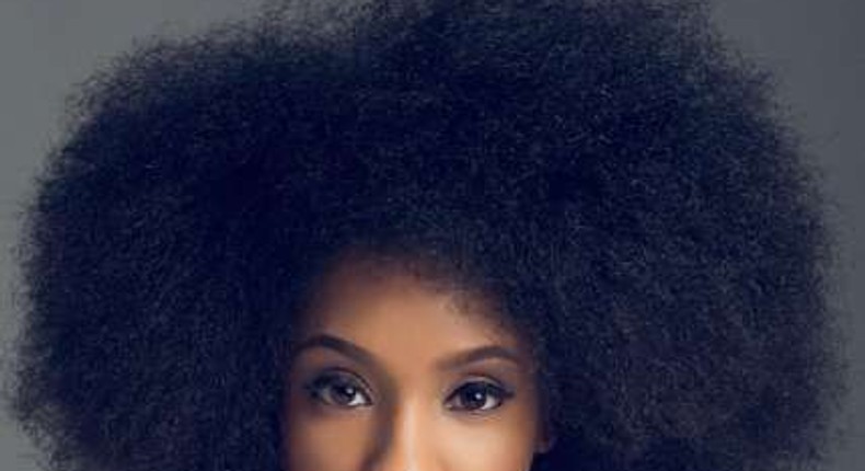 Di'Ja wears her natural hair beautifully