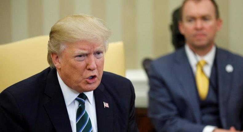 Mulvaney listens as U.S. President Donald Trump meets with members of the Republican Study Committee at the White House in Washington