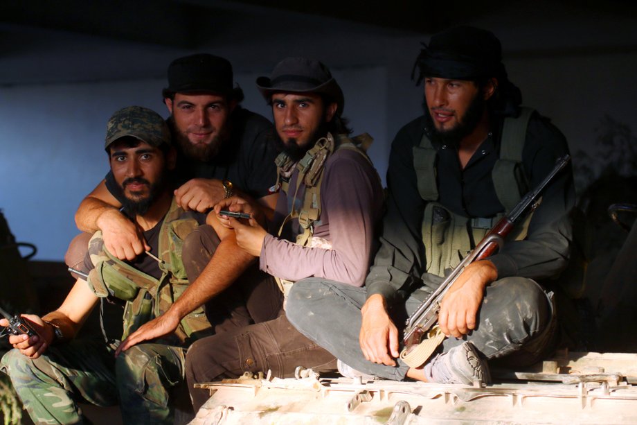 Rebel fighters in the artillery academy of Aleppo on Saturday.