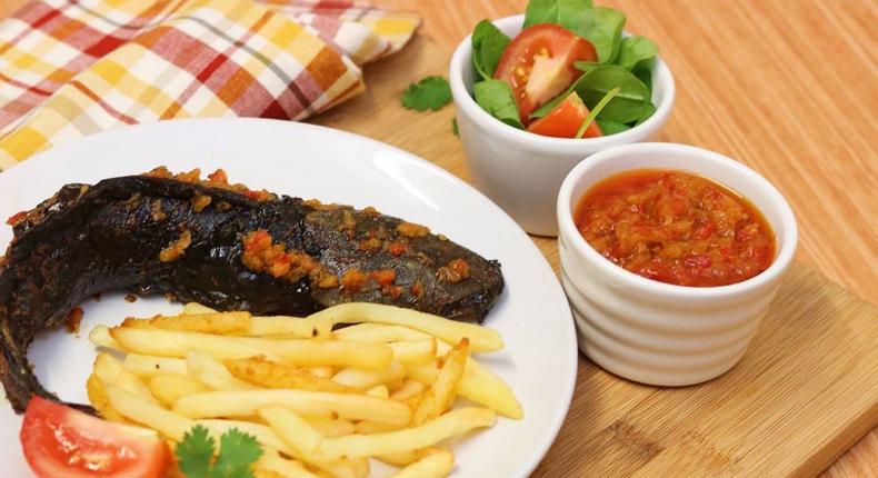 Grilled catfish, chips, pepper sauce and salad