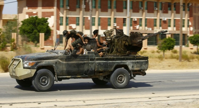 Fighters loyal to the internationally-recognised Government of National Accord are pictured during clashes with forces loyal to strongman Khalifa Haftar, in Espiaa, about 40 kilometers (25 miles) south of the Libyan capital Tripoli