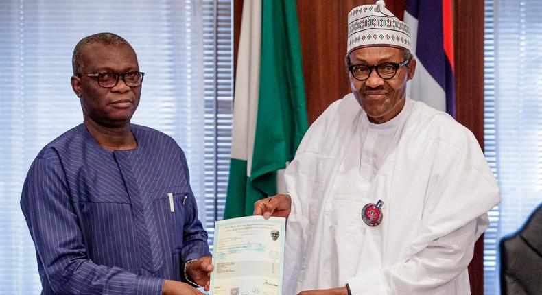 Buhari, being presented with an attestation certificate by the registrar of WAEC, Dr. Uyi Uwadiae on Friday, November 2, 2018, at the State House
