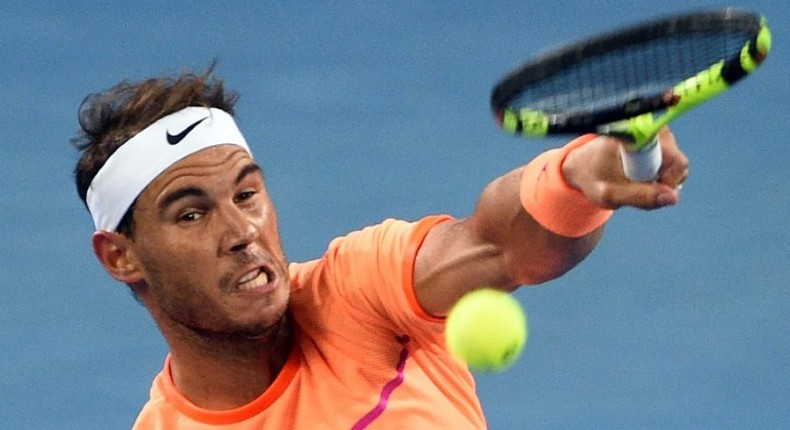 Spain's Rafael Nadal serves against Alexandr Dolgopolov of Ukraine at the Brisbane International on January 3, 2017