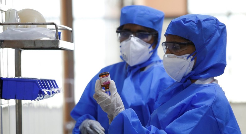 File image of medics at a laboratory