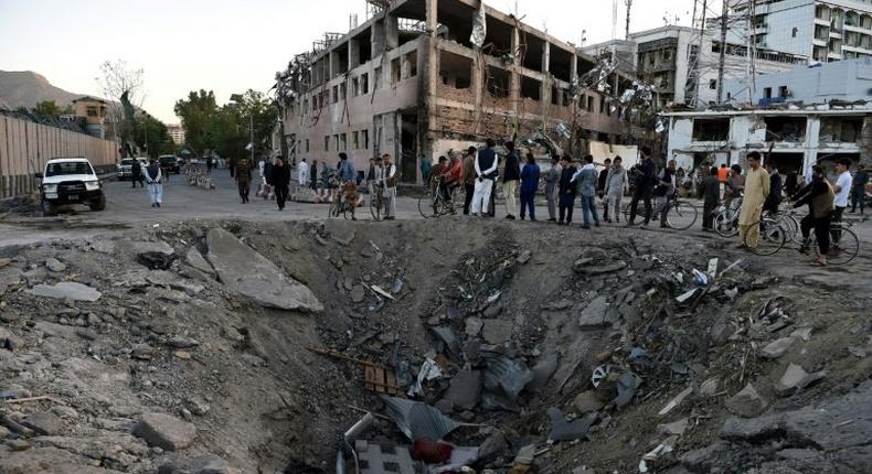 A truck bomb that ripped through Kabul's diplomatic quarter last week killed more than 150 people, Afghanistan's President Ashraf Ghani said Wednesday. The explosion blew a huge hole in the road and maimed more than 300 people.