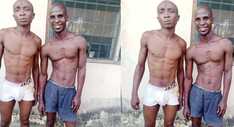 Suspected robbers pose for the cameras after being arrested by security operatives