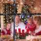 Family enjoying Christmas dinner at home in decorated room