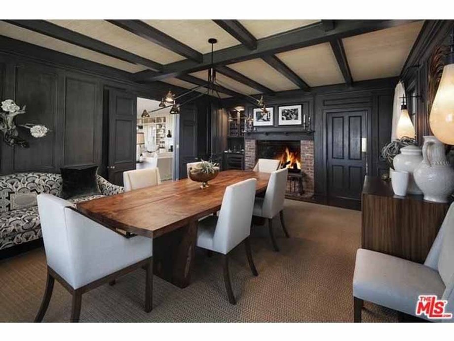 But the formal dining room is finished with dark gray woods.