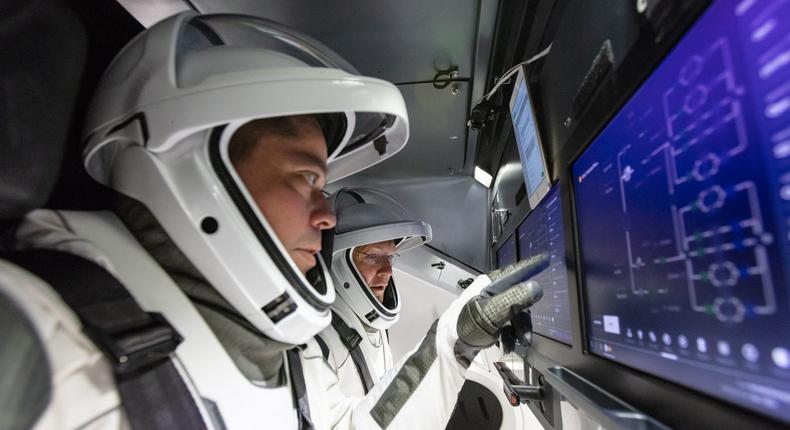 nasa astronauts doug hurley bob behnken spacex crew dragon spaceship spacesuits flight suits helmets commercial crew program ccp 48727269181_fe448ba330_o