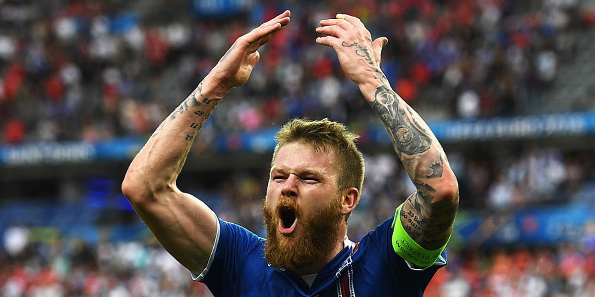 Aron Gunnarsson of Iceland celebrates his team's victory over Austria in the UEFA European Championship 2016.
