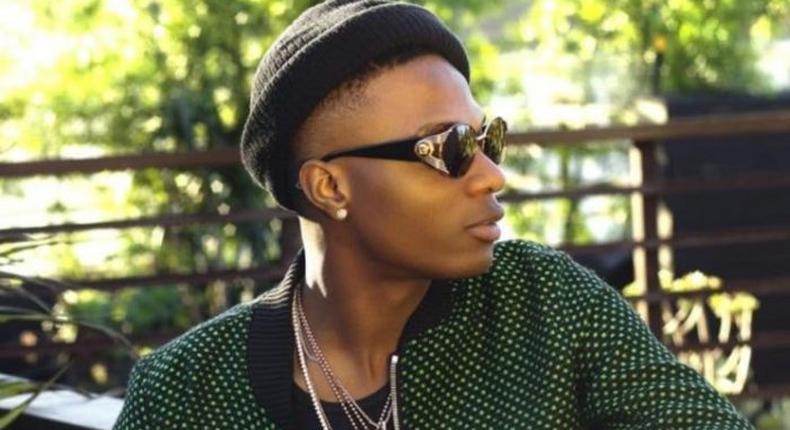 Wizkid says he turned down features for 'Made In Lagos.' (Premium Times)