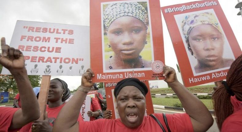Members of the Bring Back Our Girls movement press for the release of the missing Chibok schoolgirls in Lagos, in April 2016 