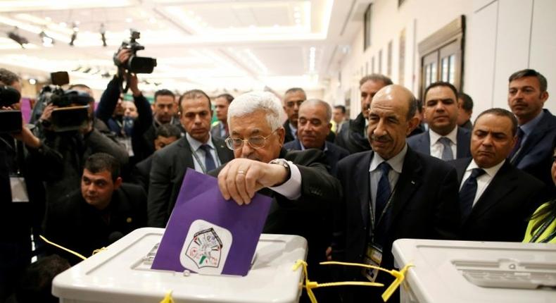 Palestinian president Mahmud Abbas casts his vote in internal Fatah party elections at the Muqataa, the Palestinian Authority headquarters, in Ramallah in December 2016