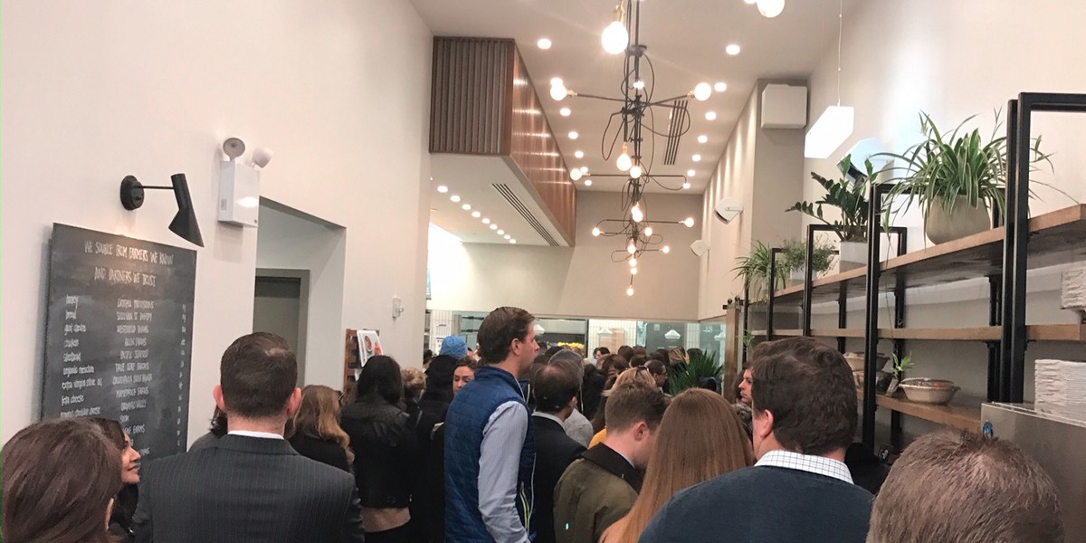 Customers wait at a crowded Sweetgreen in Midtown Manhattan on Tuesday.