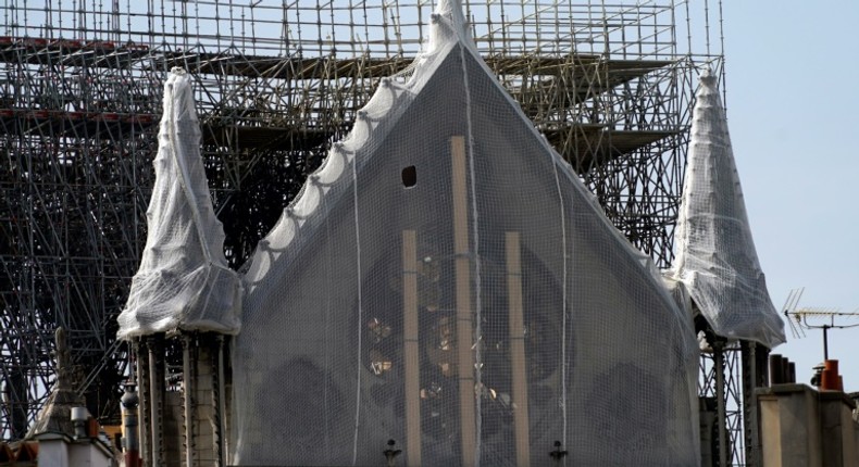 French Catholics celebrated Easter mass in Paris in the shadow of the badly burned cathedral