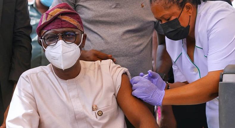 Governor Babajide Sanwo-Olu (pictured receiving his first dose of the AstraZeneca COVID-19 vaccine), wants Lagosians to buy into the state's mass vaccination programme [LASG]