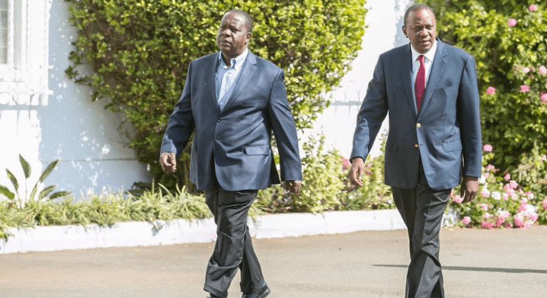 President Uhuru Kenyatta with Interior CS Fred Matiang'i