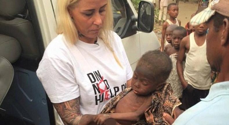 Anja Loven with the rescued boy